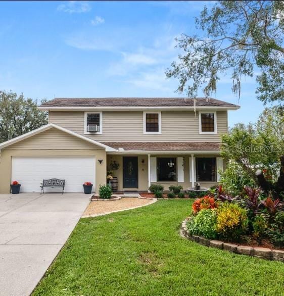 front facade featuring a front yard