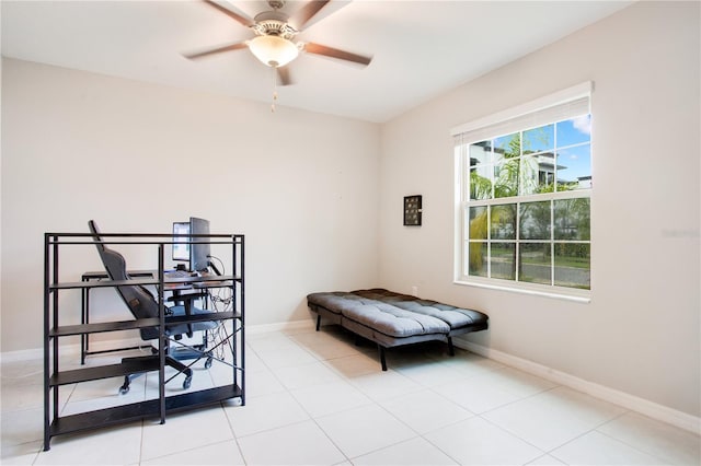 bedroom with light tile patterned floors and ceiling fan