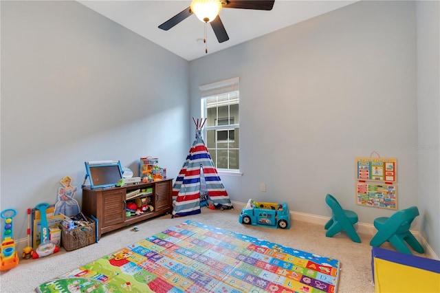 playroom with ceiling fan and carpet floors