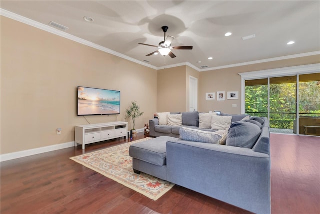 living room with crown molding, dark hardwood / wood-style flooring, and ceiling fan