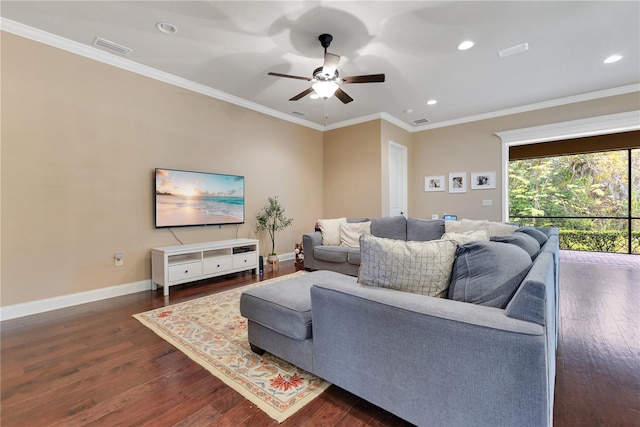 living room featuring dark hardwood / wood-style floors, ceiling fan, and crown molding