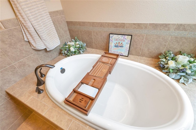 bathroom with tiled tub