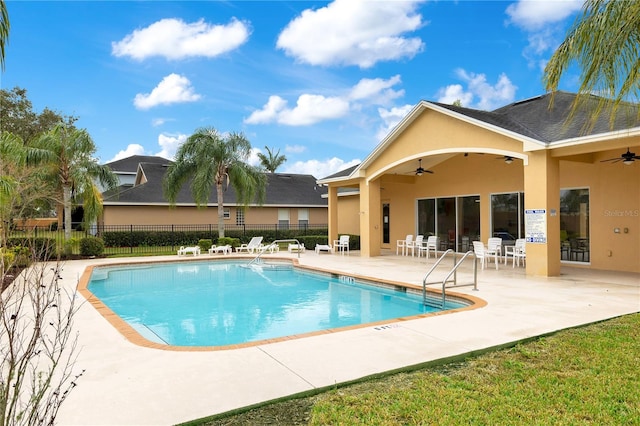 view of pool featuring a patio area and ceiling fan