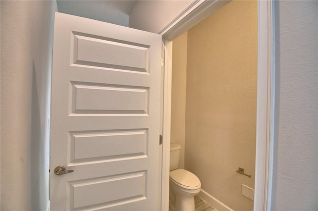 bathroom featuring toilet
