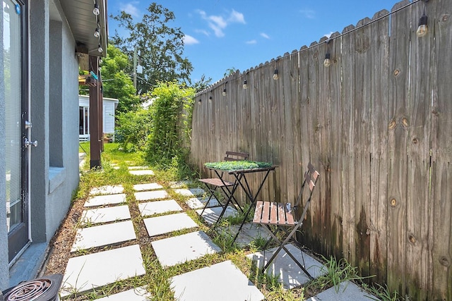 view of patio with fence