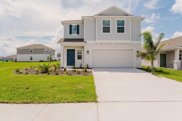 front facade with a front yard and a garage