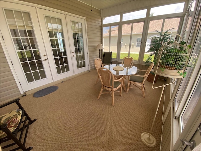 sunroom featuring french doors