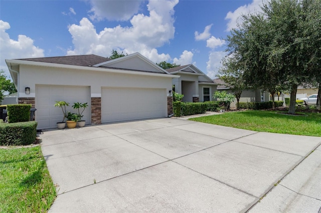 ranch-style home with driveway, a garage, stone siding, a front lawn, and stucco siding