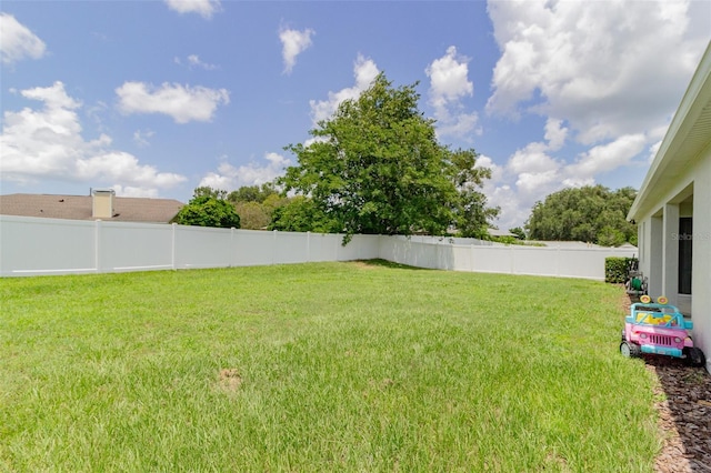 view of yard featuring a fenced backyard