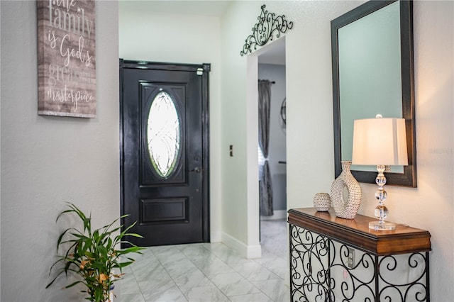 view of tiled foyer