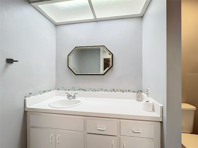 half bath with toilet and vanity