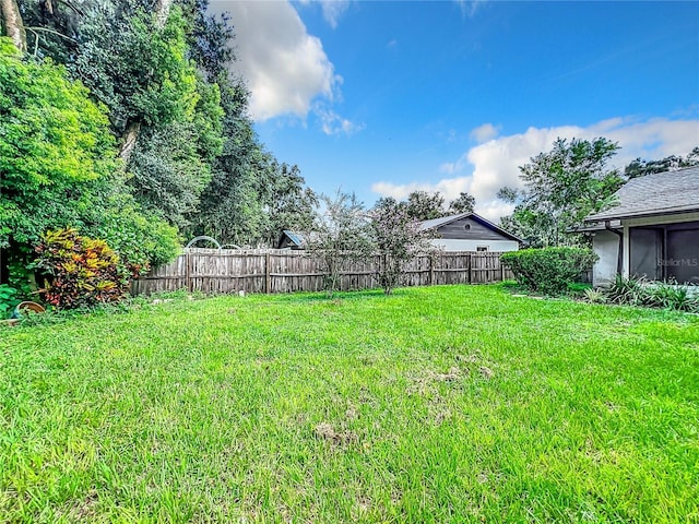 view of yard with fence