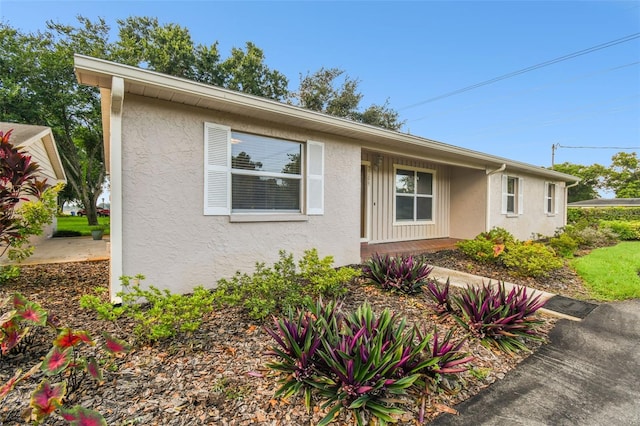 view of front of house featuring stucco siding