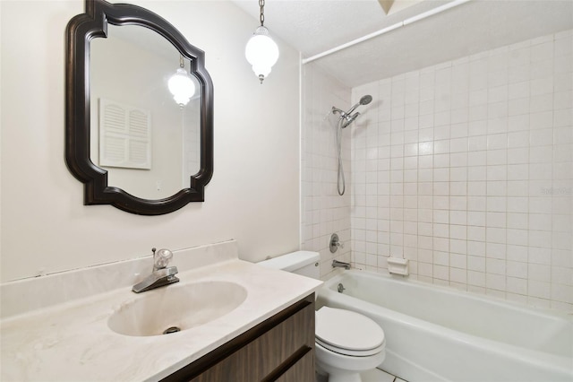 bathroom featuring toilet, vanity, and shower / tub combination