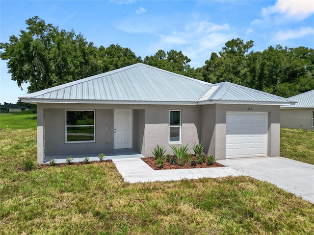 ranch-style home with a front lawn and a garage