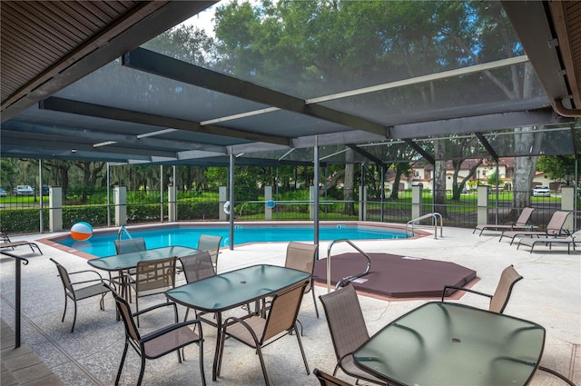 view of swimming pool with a patio area