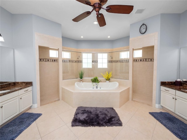 bathroom featuring tile patterned flooring, ceiling fan, and shower with separate bathtub