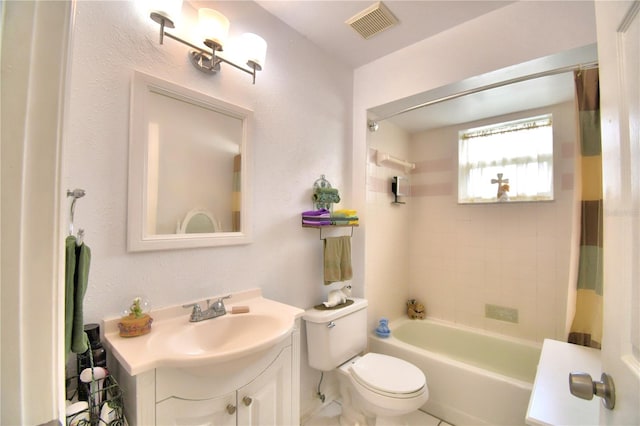 full bathroom with toilet, vanity, shower / bath combo, and tile patterned floors