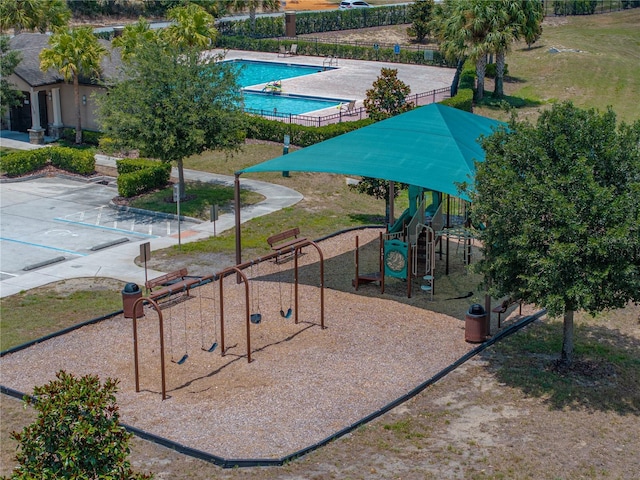 view of home's community featuring a playground