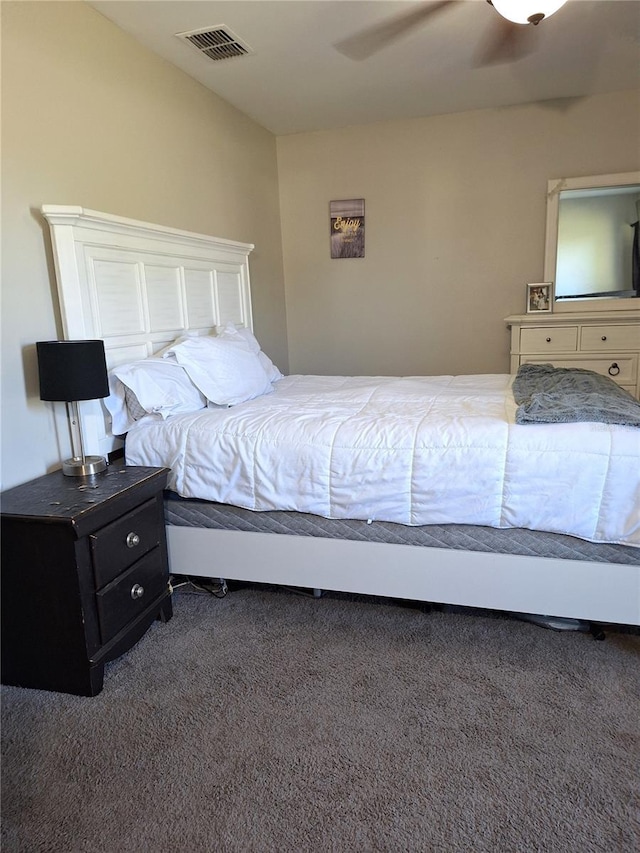 bedroom featuring carpet, visible vents, and a ceiling fan