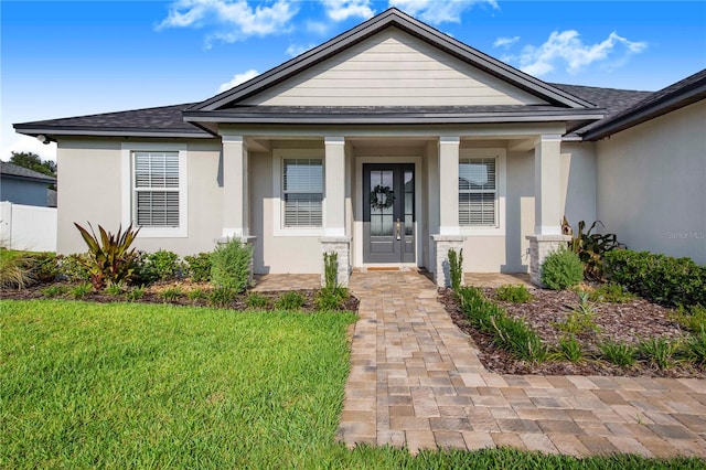 bungalow-style home featuring a front yard and a porch