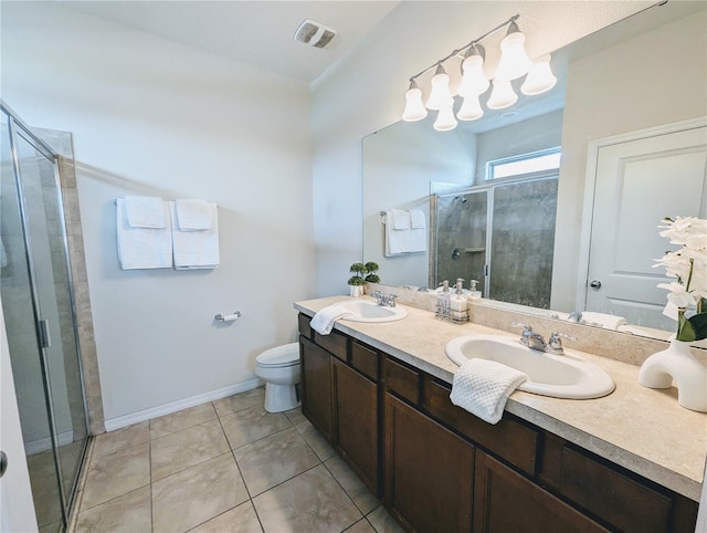 bathroom with toilet, double vanity, walk in shower, and tile patterned floors