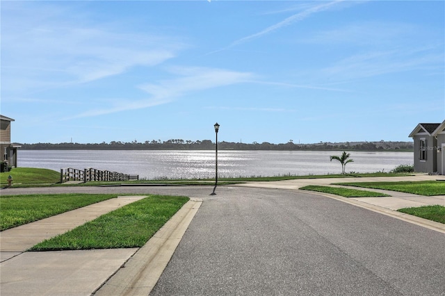 view of street with a water view