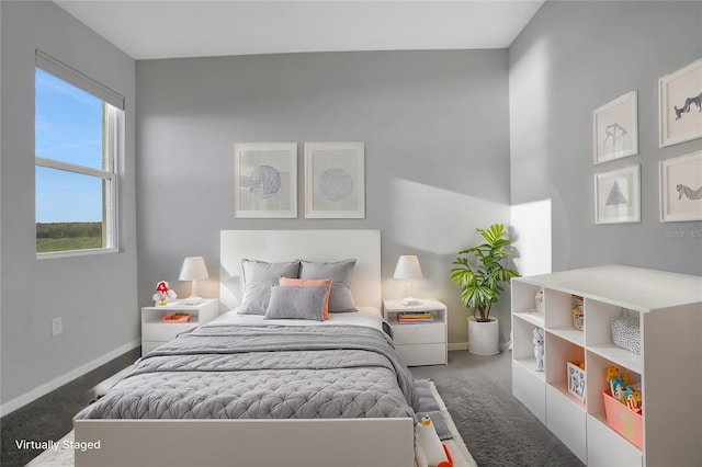 bedroom featuring dark colored carpet