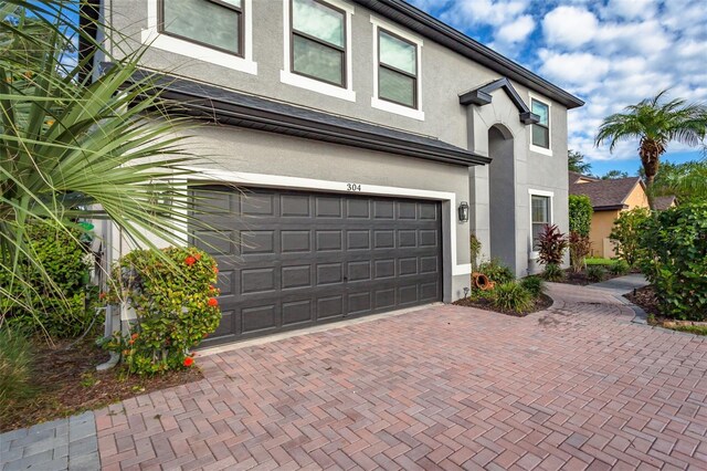 exterior space with a garage