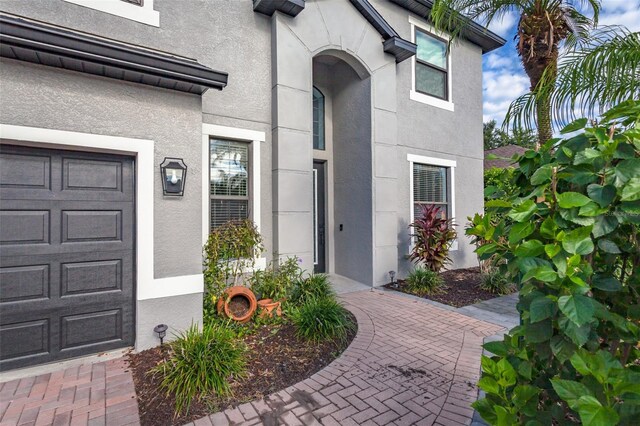 property entrance featuring a garage