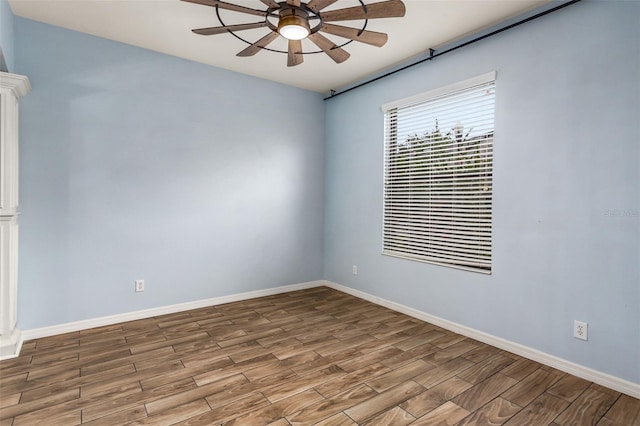 unfurnished room featuring hardwood / wood-style floors and ceiling fan