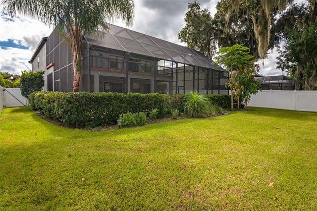 view of yard with a lanai