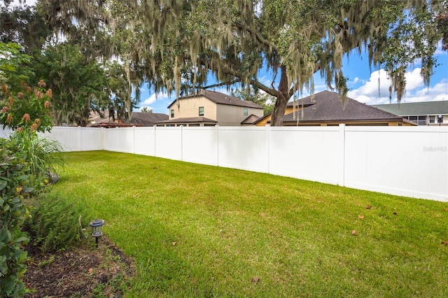 view of yard with a water view