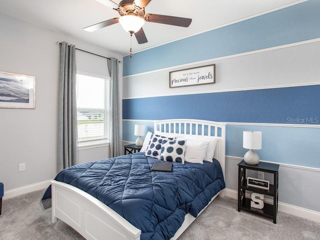 bedroom with ceiling fan and carpet