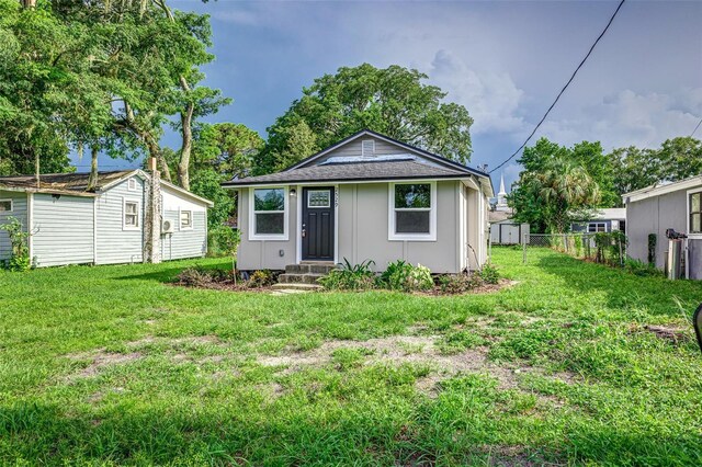 view of front of home with a front yard