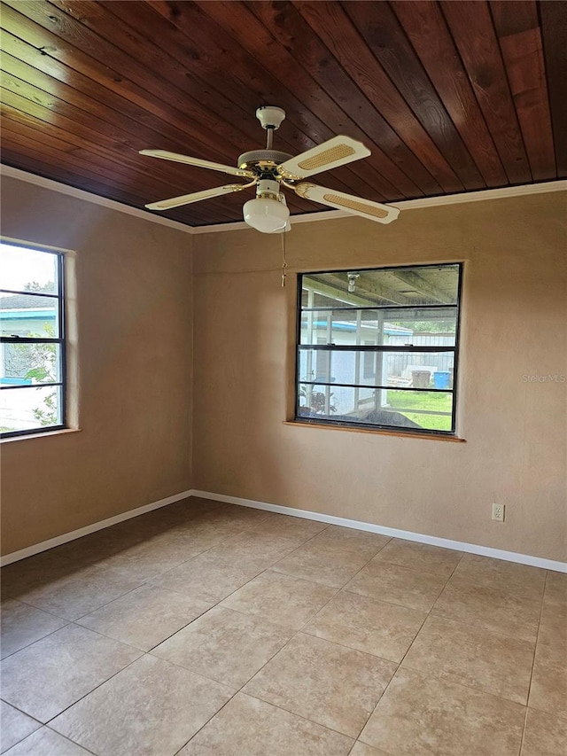 tiled spare room featuring wooden ceiling, crown molding, and ceiling fan