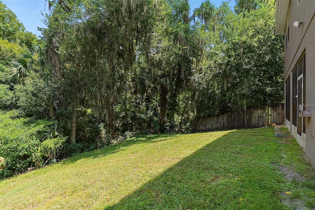 view of yard with fence