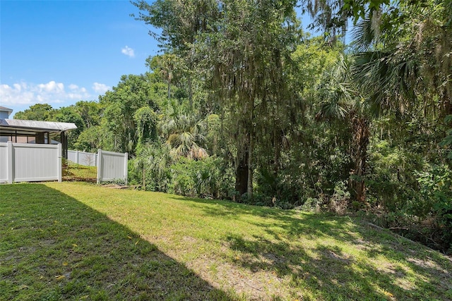 view of yard with fence