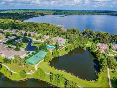 drone / aerial view with a water view