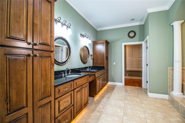 bathroom with tile patterned flooring, vanity, crown molding, and ornate columns