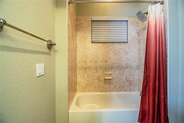 bathroom featuring shower / tub combo