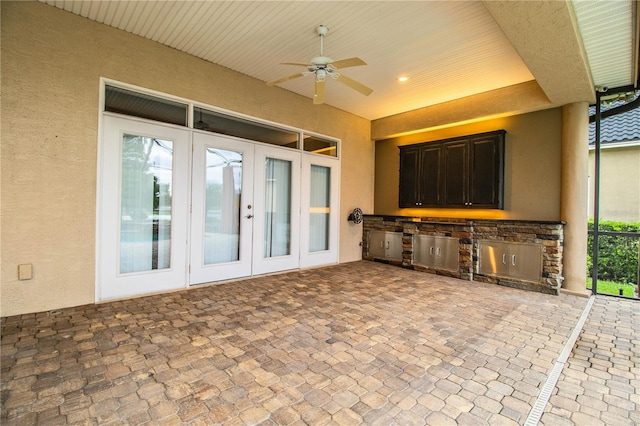 view of patio / terrace with french doors, area for grilling, and ceiling fan