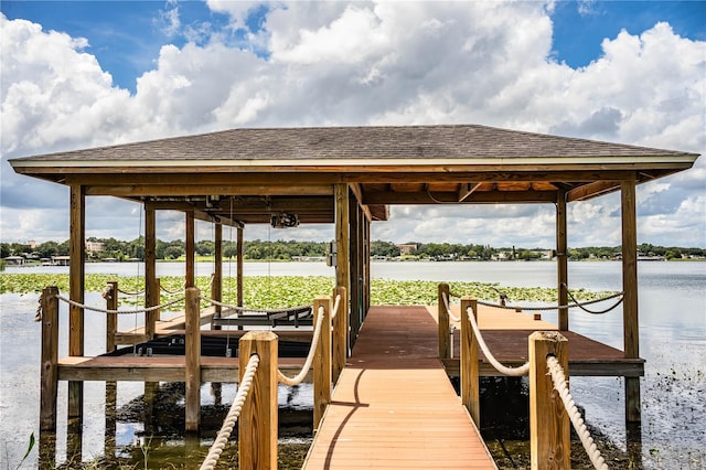 view of dock with a water view