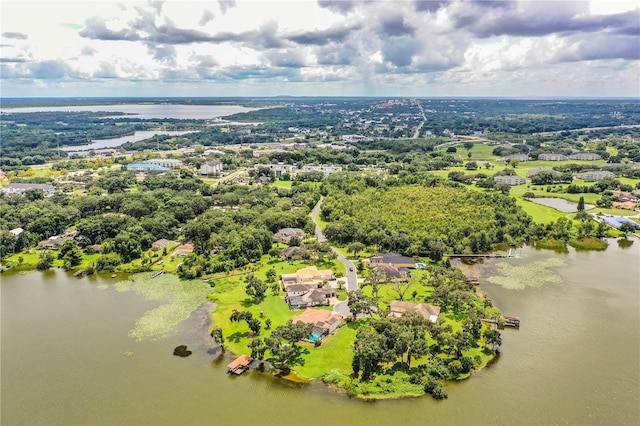 drone / aerial view with a water view