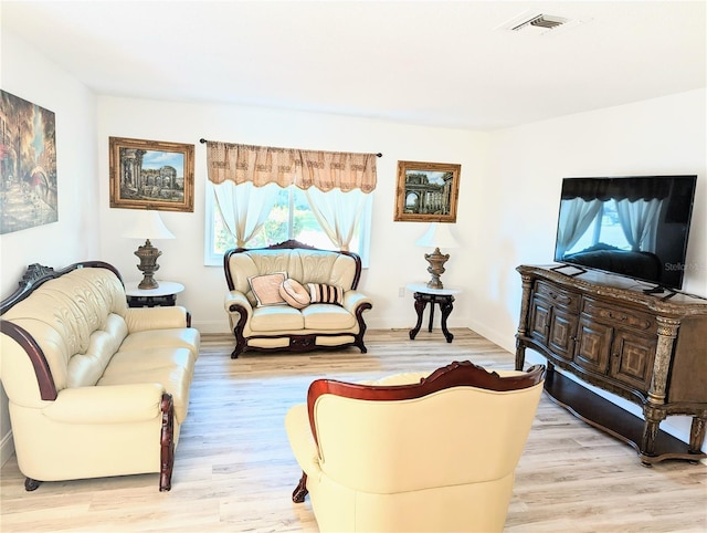 living room featuring light wood-type flooring