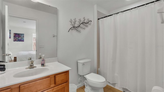 bathroom featuring shower / bathtub combination with curtain, toilet, vanity, ensuite bath, and tile patterned floors