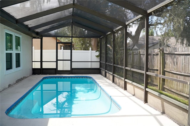 view of pool with a lanai