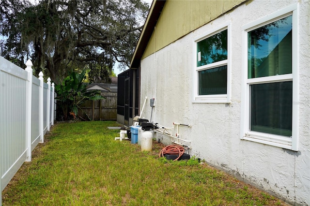 view of yard with a fenced backyard