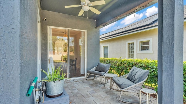 view of patio / terrace with ceiling fan