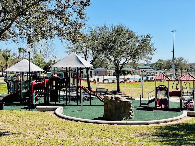 view of play area featuring a yard